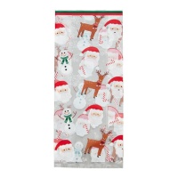 Sacs transparents pour friandises scène de Noël 24 x 10 cm - Wilton - 20 unités